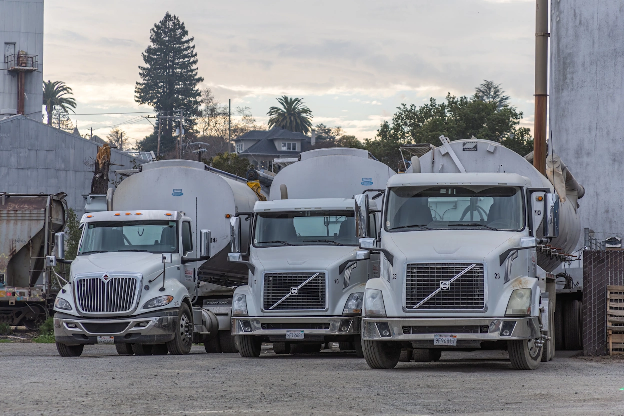 3 large trucks of the business's vehicles