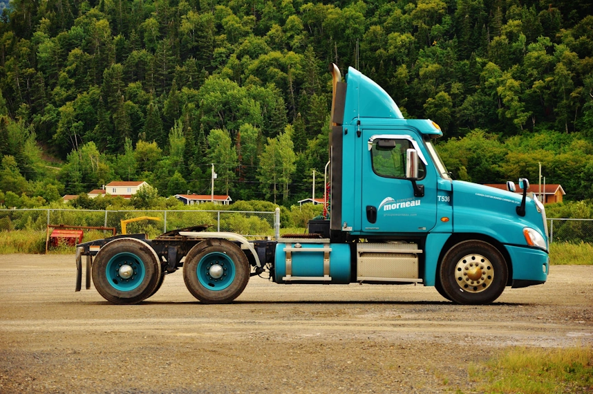 business's truck sideview with the body color of light blue